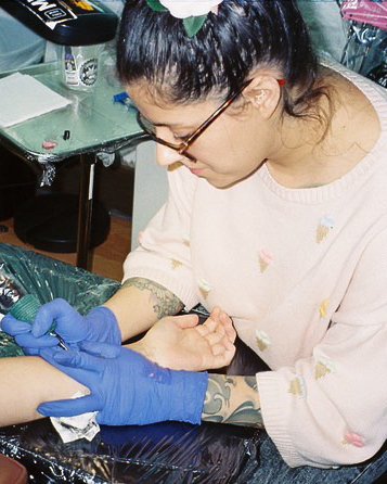 Danielle Dani Lopez a tattooer at Near Me Tattoo in Woodstock Ga 30189